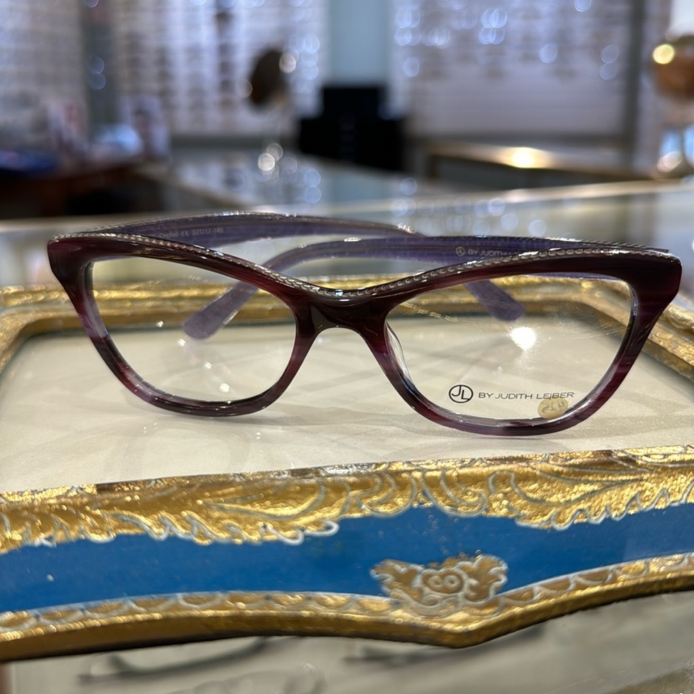 Judith Leiber eyeglasses. The most amazing brown and purple colors.